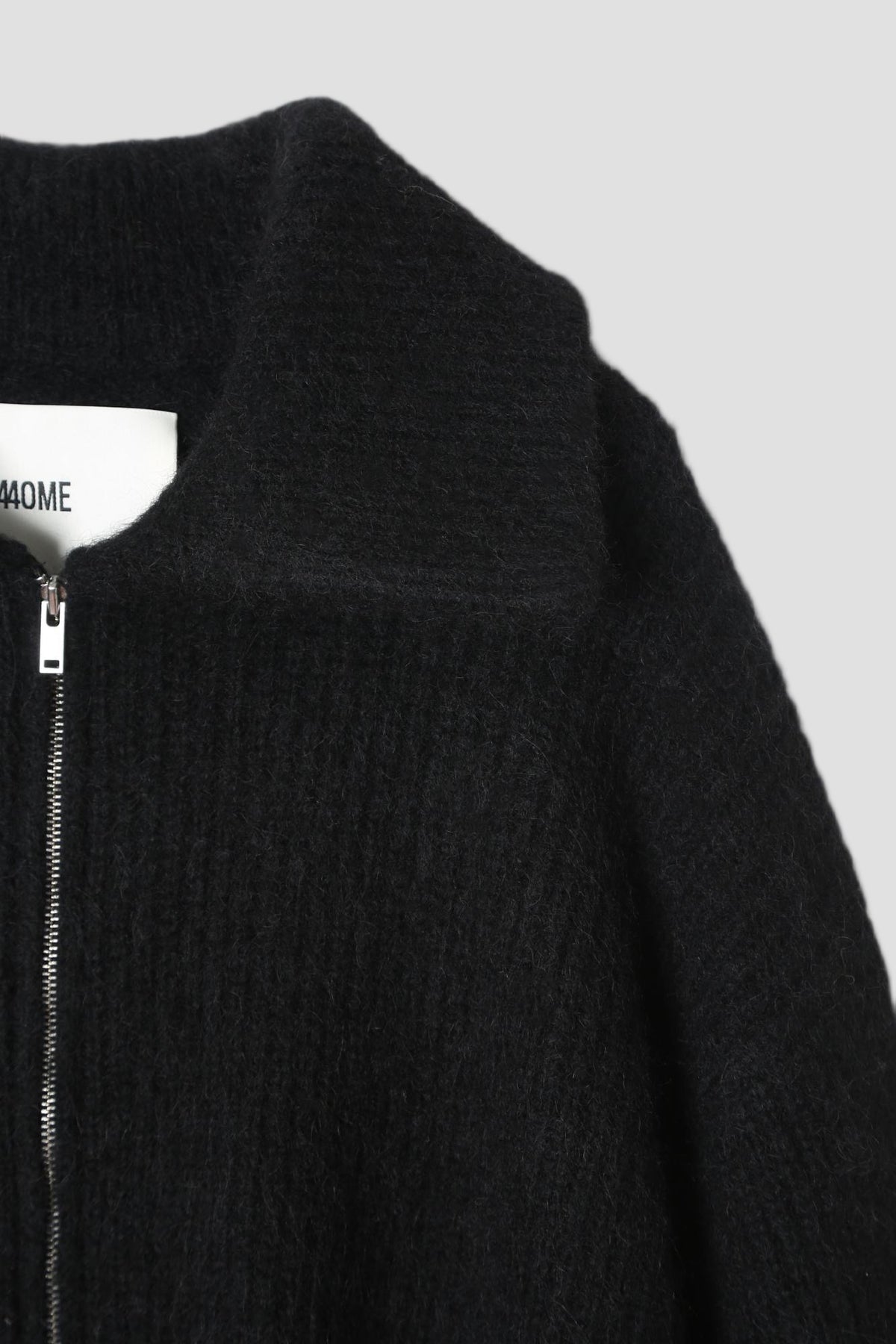 Alpaca Wool Zip Up in Black - detail #colour_Black