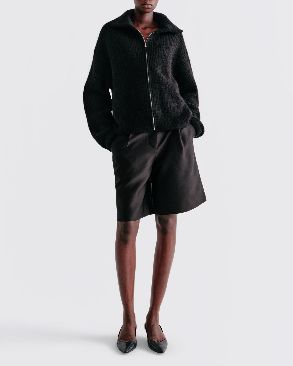 Alpaca Wool Zip Up in Black - front view #colour_Black