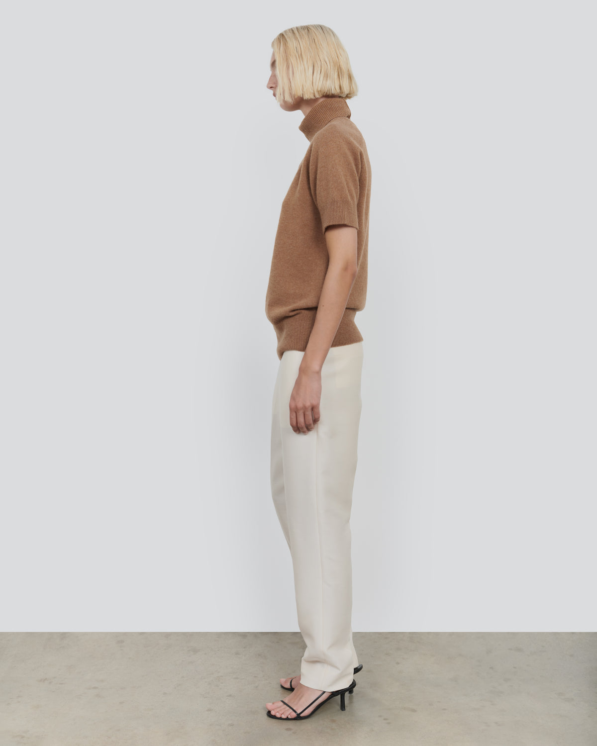 ESSENTIAL WOOL SHORT SLEEVE TURTLENECK in Camel - side view #colour_Camel