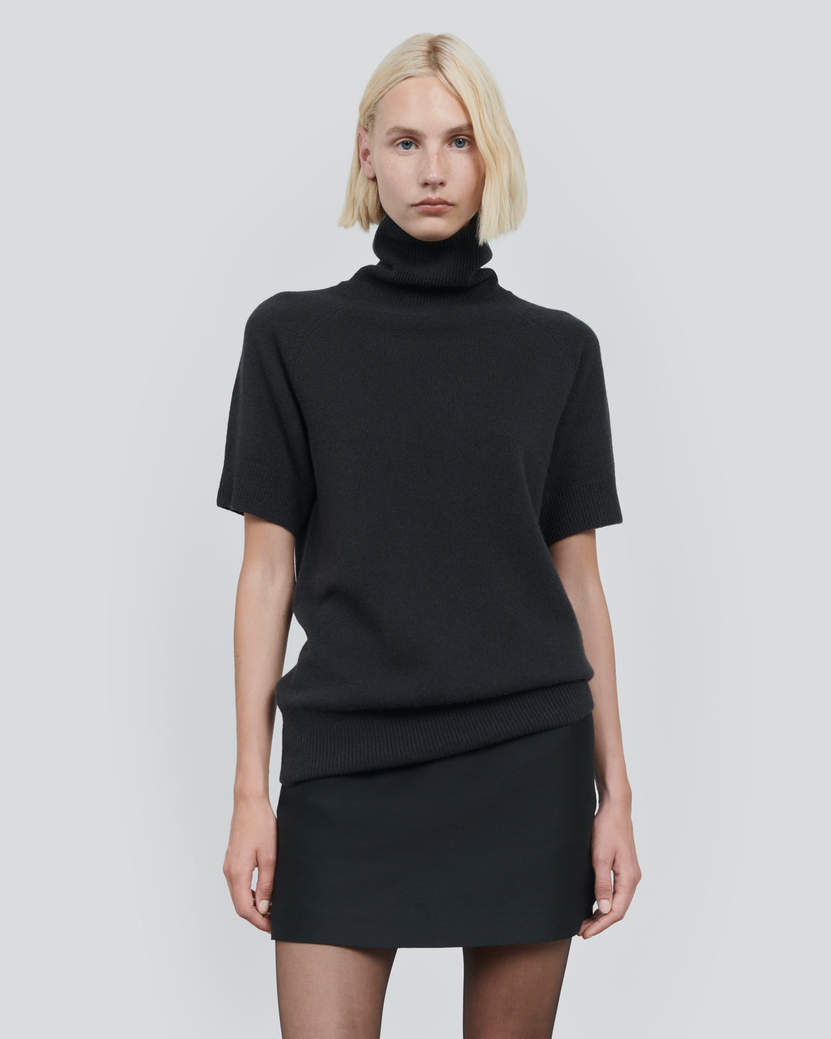 ESSENTIAL WOOL SHORT SLEEVE TURTLENECK in Dark Grey - close-up #colour_Dark Grey