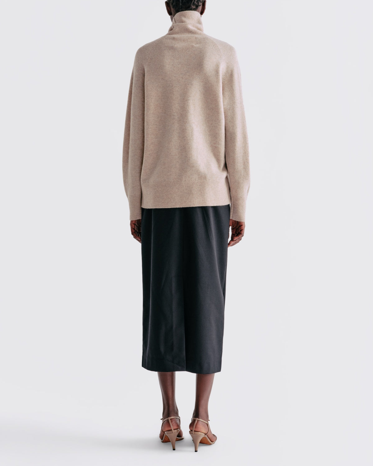 Essential Wool Long Sleeve Turtleneck in Sand - back view #colour_Sand